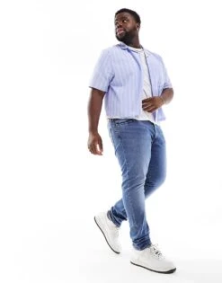 Levi's Big & Tall 512 Slim Taper Jeans In Mid Blue For Men